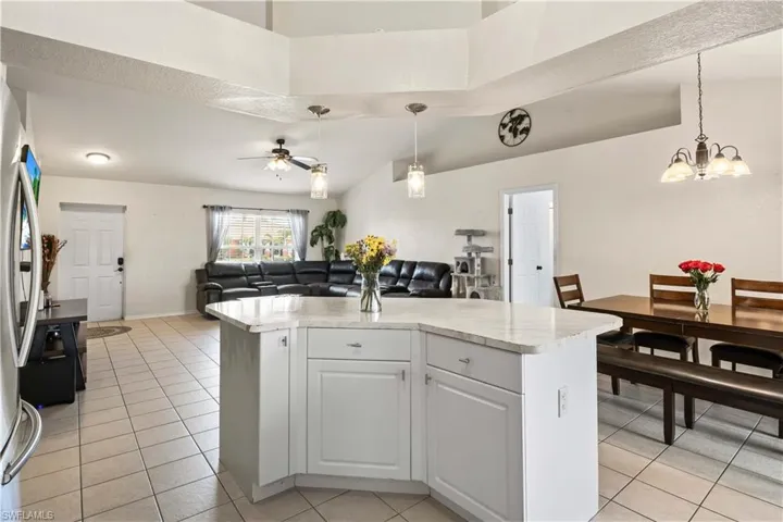 he kitchen’s open design flows effortlessly into the living and dining areas, creating a perfect environment for both everyday meals and large-scale entertaining.