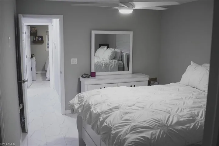 Bedroom featuring ceiling fan