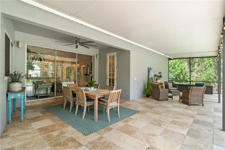 an abundance of shaded dining and lounge area for expanded entertaining