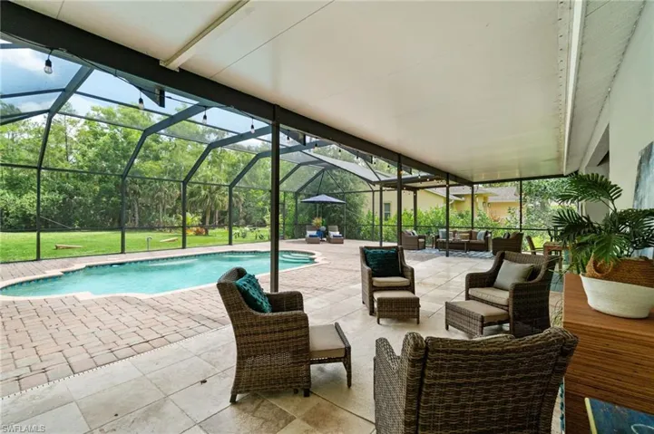 an abundance of shaded dining and lounge area for expanded entertaining