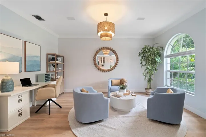 Front sitting room off of the entry serves as the perfect den space