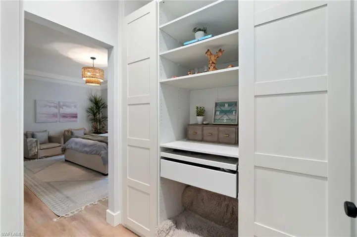 Custom closet space in the master entry hallway