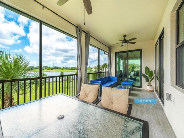 Beautifully tiled commodious lanai features two ceiling fans, professionally tiled wood grain flooring with ample space for comfortable outdoor furniture and dining area, enjoy a relaxing meal with a wonderful waterfront view