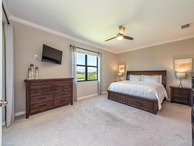 Home features an oversized primary bedroom suite with direct access to the spacious, peaceful lanai and abundant rich natural light complete with remote operated ceiling fan and lighting