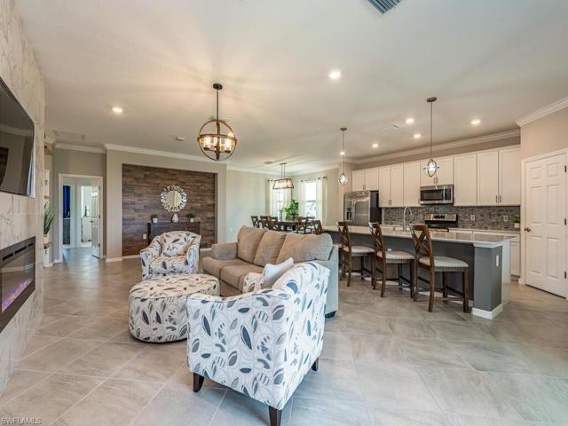 Luxurious open space seamlessly connects the kitchen, living and dining areas featuring two custom accent walls, great space for entertaining