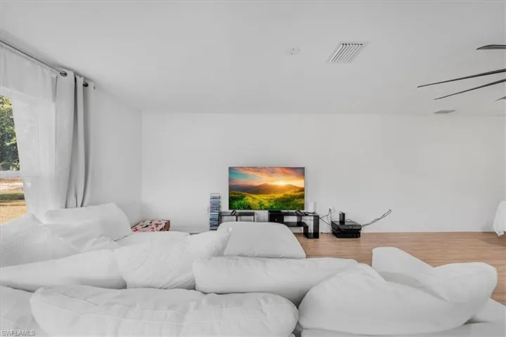 Bedroom with wood finished floors