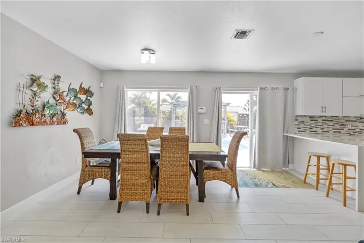 Dining area with healthy amount of natural light