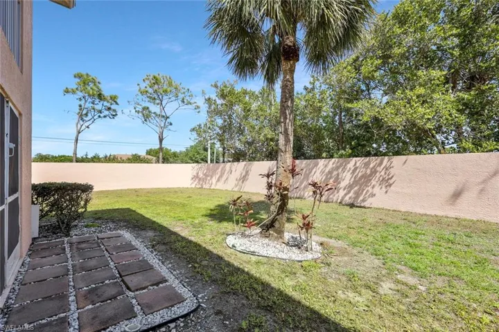 View of yard featuring a patio area and a fenced backyard