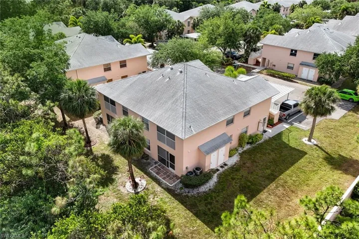 Birds eye view of property with a residential view