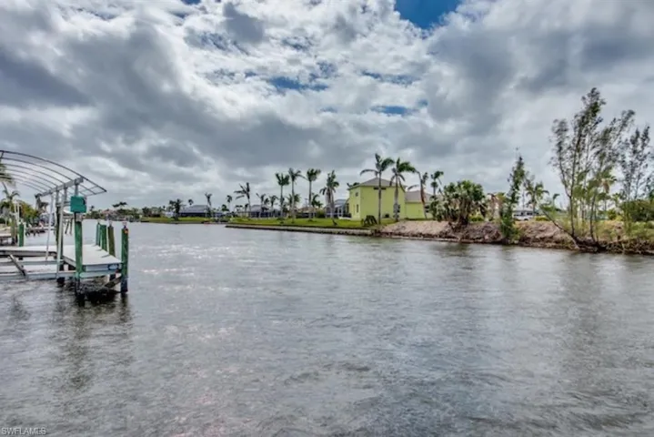 Water view with a dock