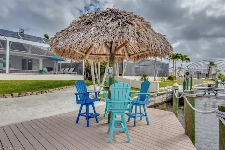 View of dock featuring a lanai