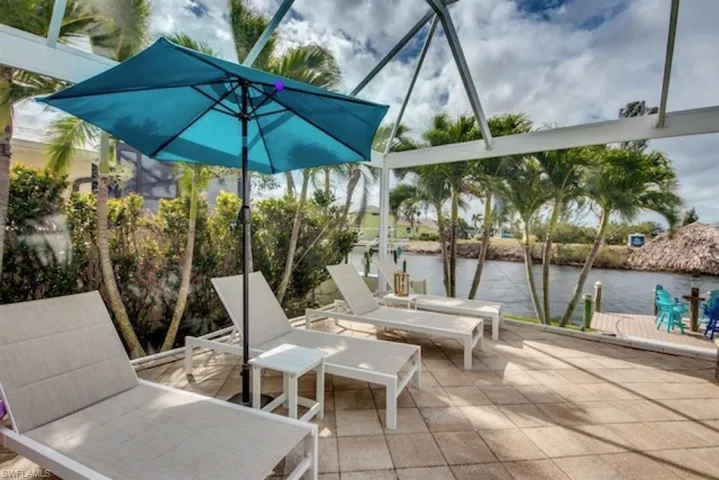 View of terrace featuring a water view
