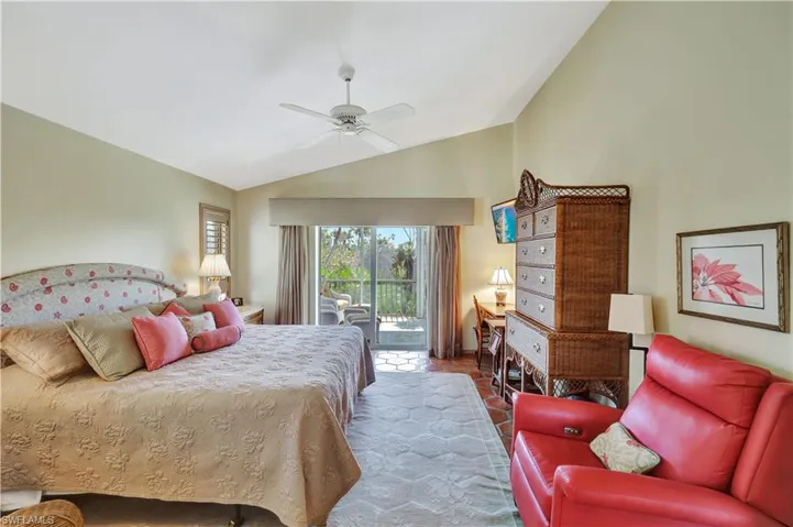 Bedroom featuring access to outside, high vaulted ceiling, and ceiling fan