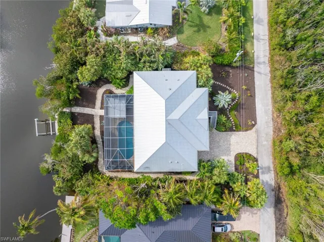 Aerial view featuring a water view