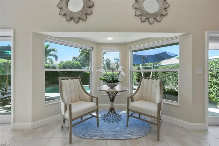 Sitting area in a bay window adds light and charm
