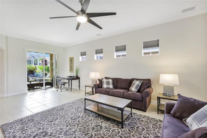 Lge LR w/ sliders out to Courtyard plenty of space for a game table too!