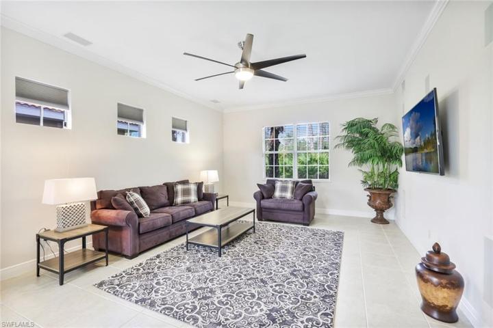 Large Living Rm space w/rear view of private preserve