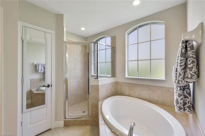 Soaking Tub and Walk in Shower plus Linen Closet