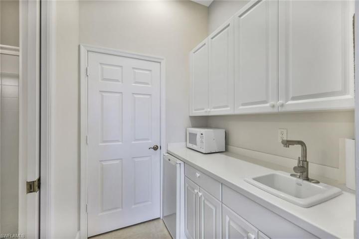 Morning Kitchen in GST Qtrs, sink, micro and refrig, hall closet