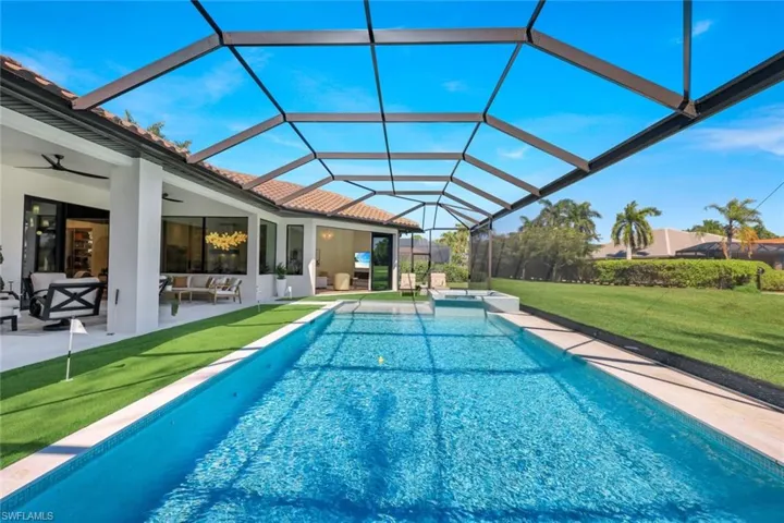 36' Pool and 7' by 6' Spa with 16' putting green