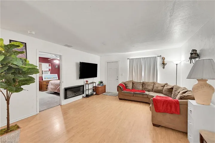 Living room featuring light wood finished floors.