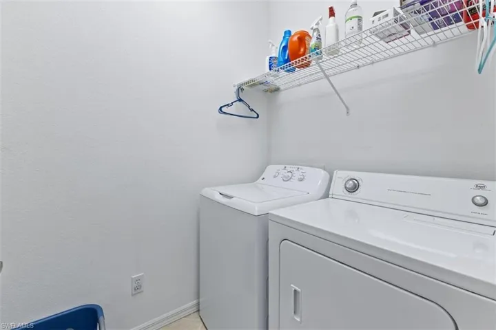 Laundry room featuring washing machine and dryer