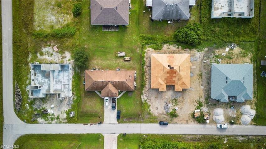 Aerial shot of all 3 duplexes available on Kenneth Ave S - 2 standard and one corner model.