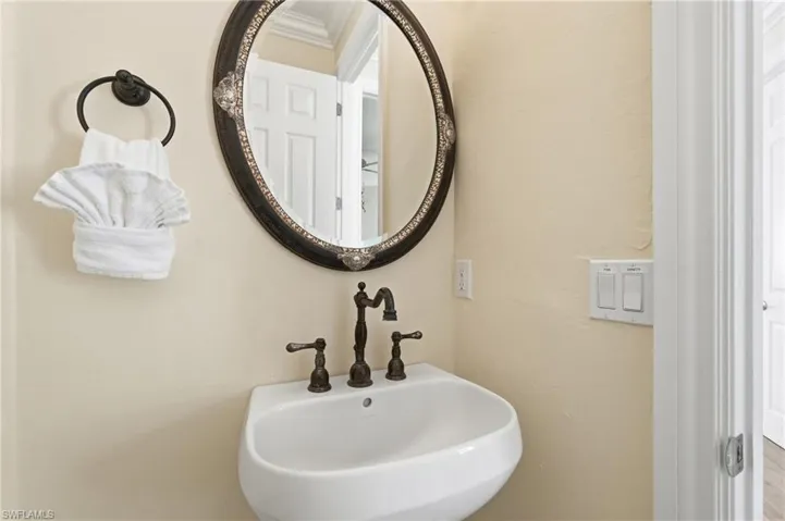 Pedestal sink with oil-rubbed bronze faucet - Virtually Edited Image
