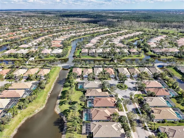 Drone / aerial view featuring a residential view and a water view