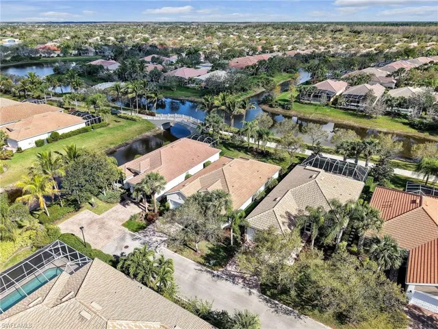 Aerial view with a water view and a residential view