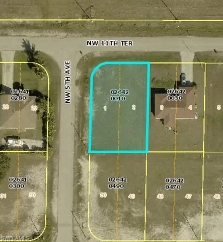 Aerial map of property and surrounding area with property boundaries highlighted
