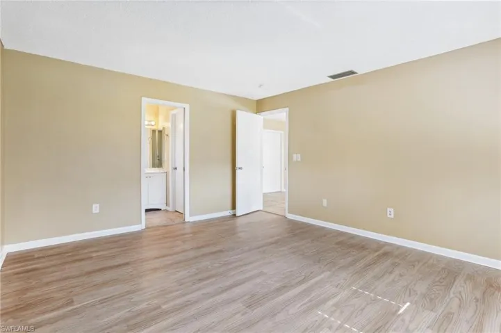 Spare room with light hardwood / wood-style floors