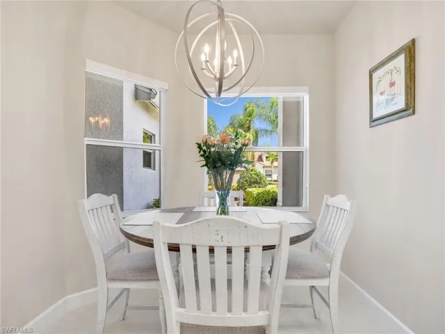 Dining area with an inviting chandelier