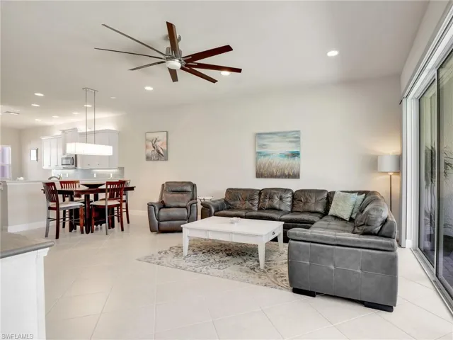 Tiled living room with ceiling fan