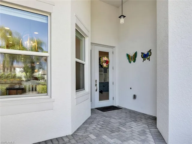 Entrance to property with a patio
