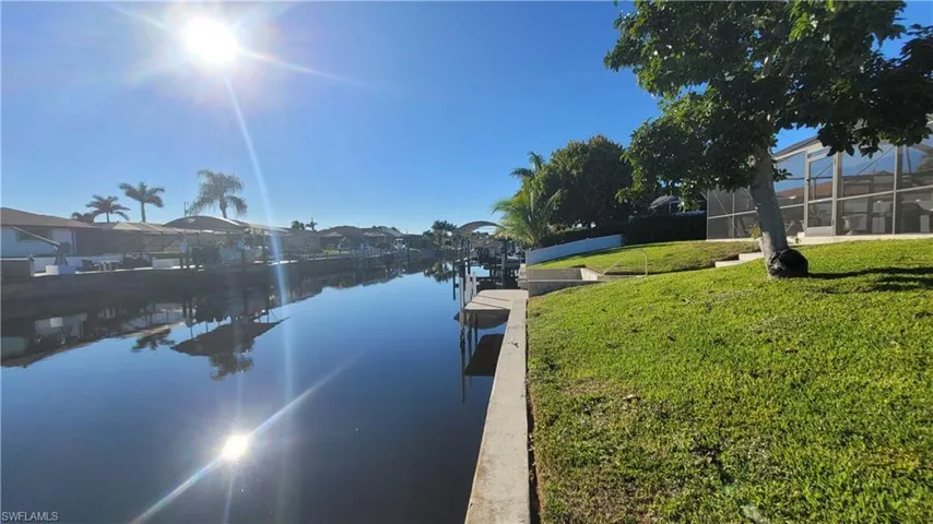 Water view with a dock