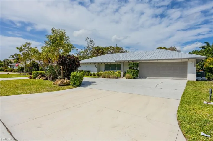 409 Cypress Way E, Naples, Florida 34110