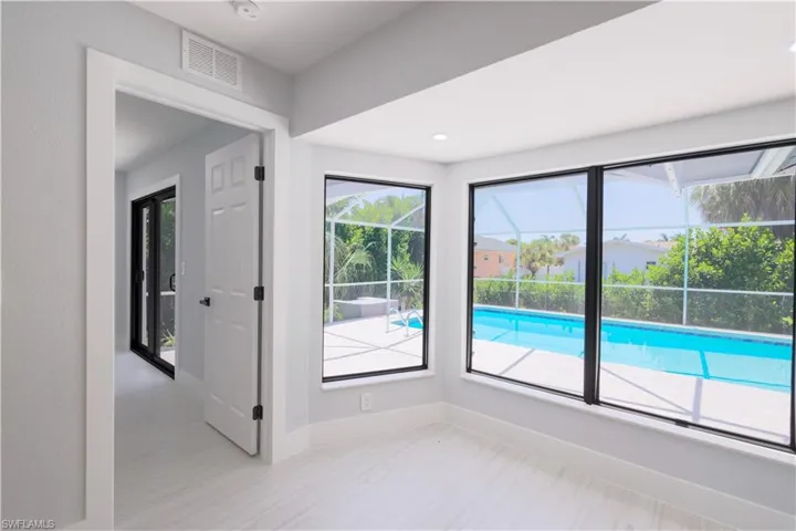 Spare room featuring a wealth of natural light