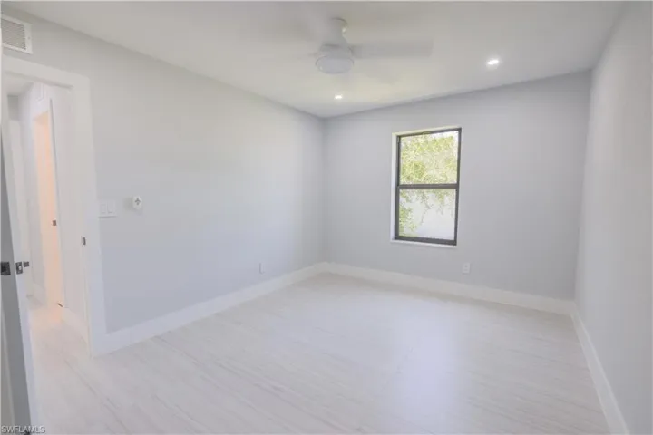 Unfurnished room with ceiling fan