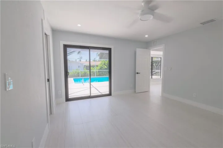 Unfurnished room featuring ceiling fan