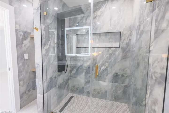 Bathroom with an enclosed shower