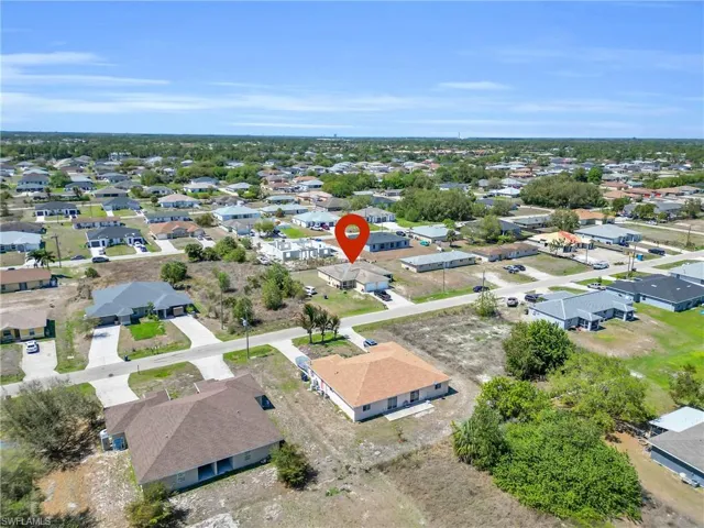 Aerial perspective showcasing a residential area with varied housing styles