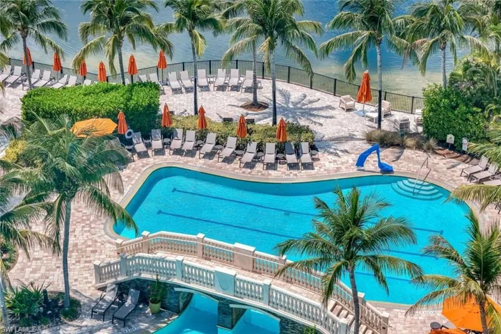 Community pool with a patio area