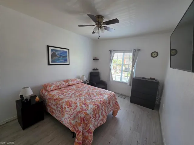 Bedroom featuring light wood finished floors and ceiling fan