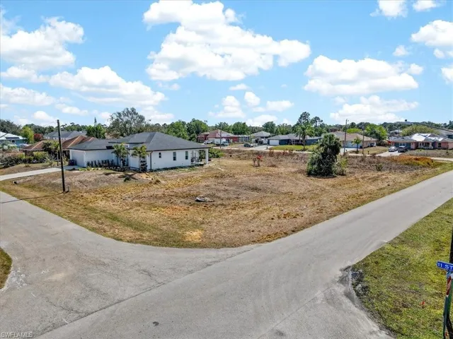 View of asphalt road with a residential view