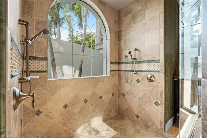 Bathroom with a tile shower