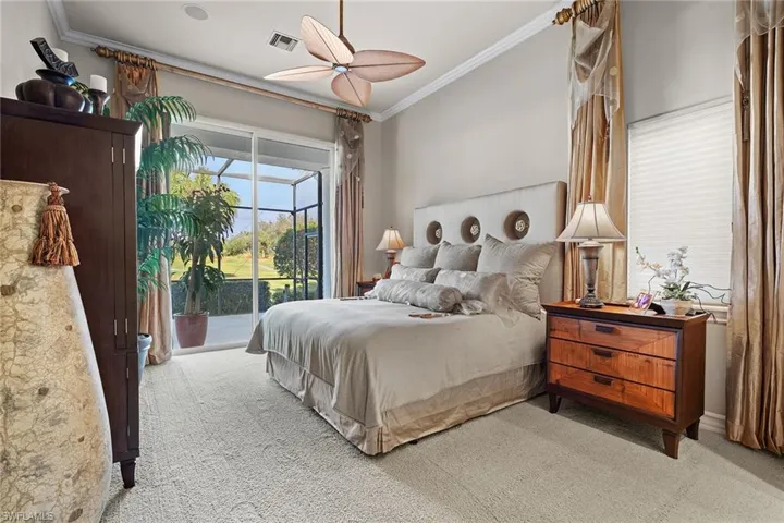 Bedroom featuring crown molding, light carpet, access to outside, and ceiling fan