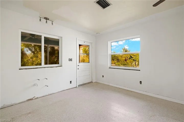 Side 2 Kitchen area & back door to lanai