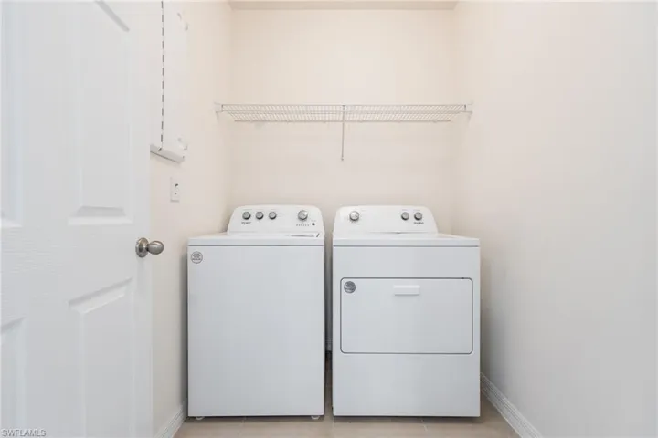 Laundry room featuring washing machine and dryer