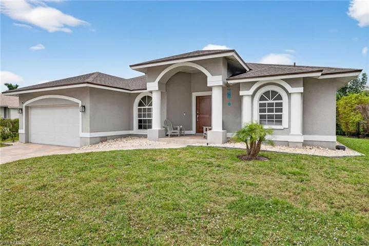 Street view. Located in quiet neighborhood close to beach, recreation, shopping, and schools.